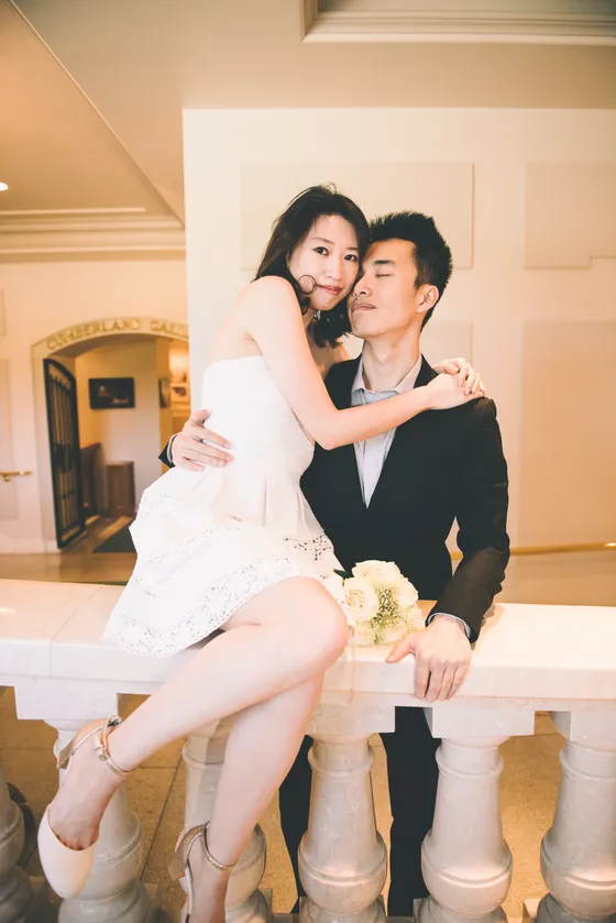 Couple walking hand in hand during engagement session