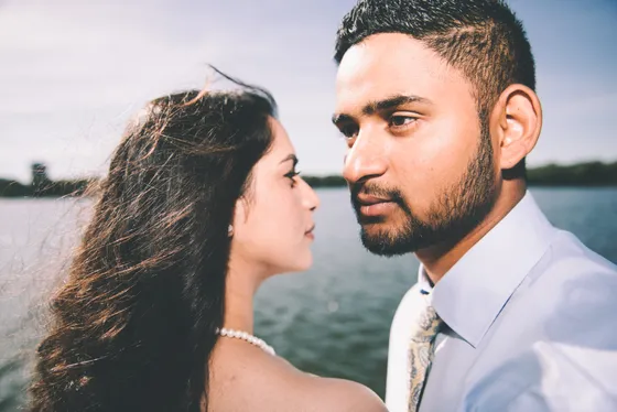 Couple sharing intimate moment during engagement session