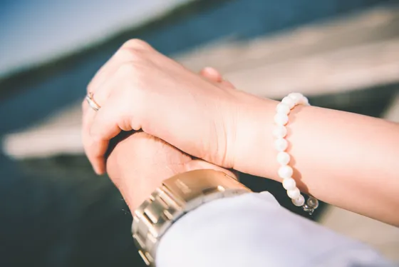 Romantic kiss during golden hour engagement shoot