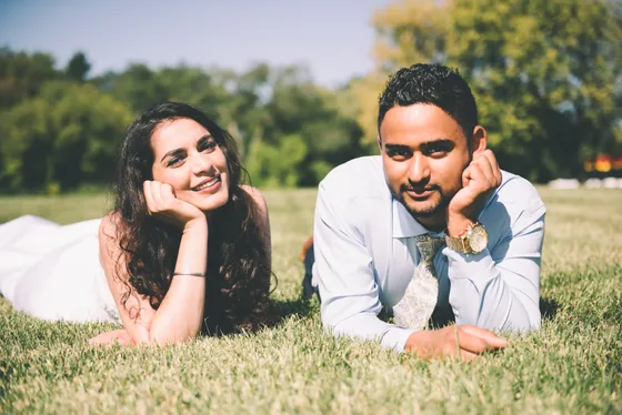 Couple sharing intimate moment during engagement session