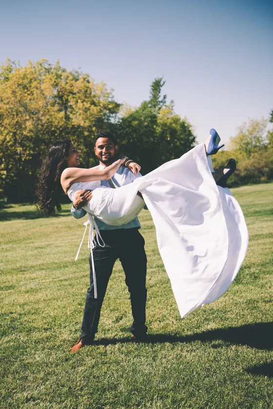 Candid laughter between engaged couple