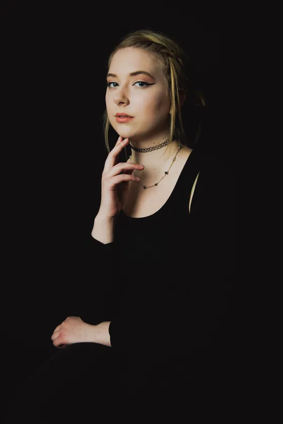 Classic headshot in controlled studio environment