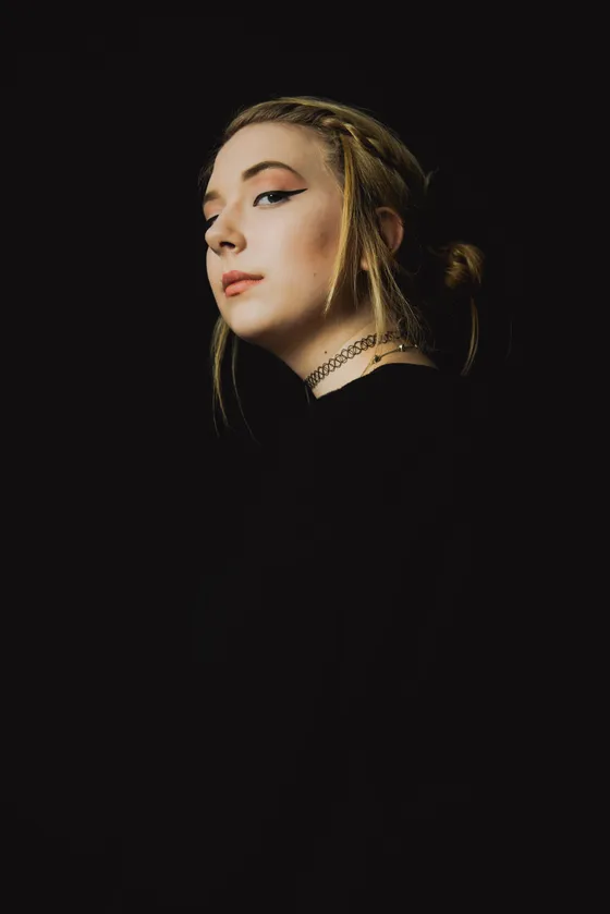 Creative studio portrait with artistic lighting