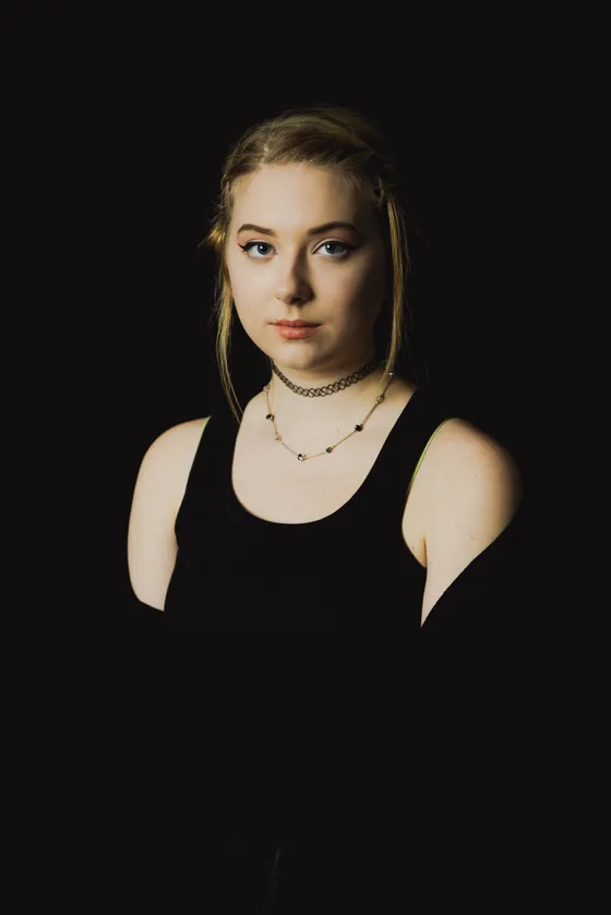 Elegant portrait against clean studio backdrop